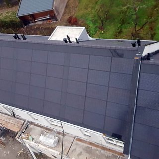 BiTile - Standaard formaat Soluxtec zonnepaneel - Leypad Haaren - Blok C 7 woningen - paspanelen op woning scheidende wand